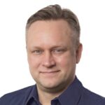 a head shot of Benjamin Perry